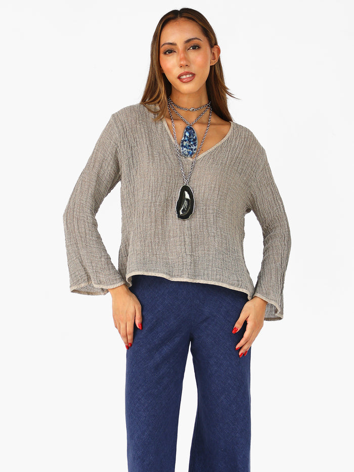 Blusa escote V con bies en contraste en lino