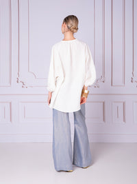 Blusa con aletilla y manga raglán en lino