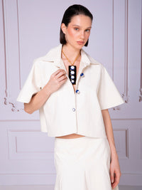 Blusa camisera asimétrica en lino