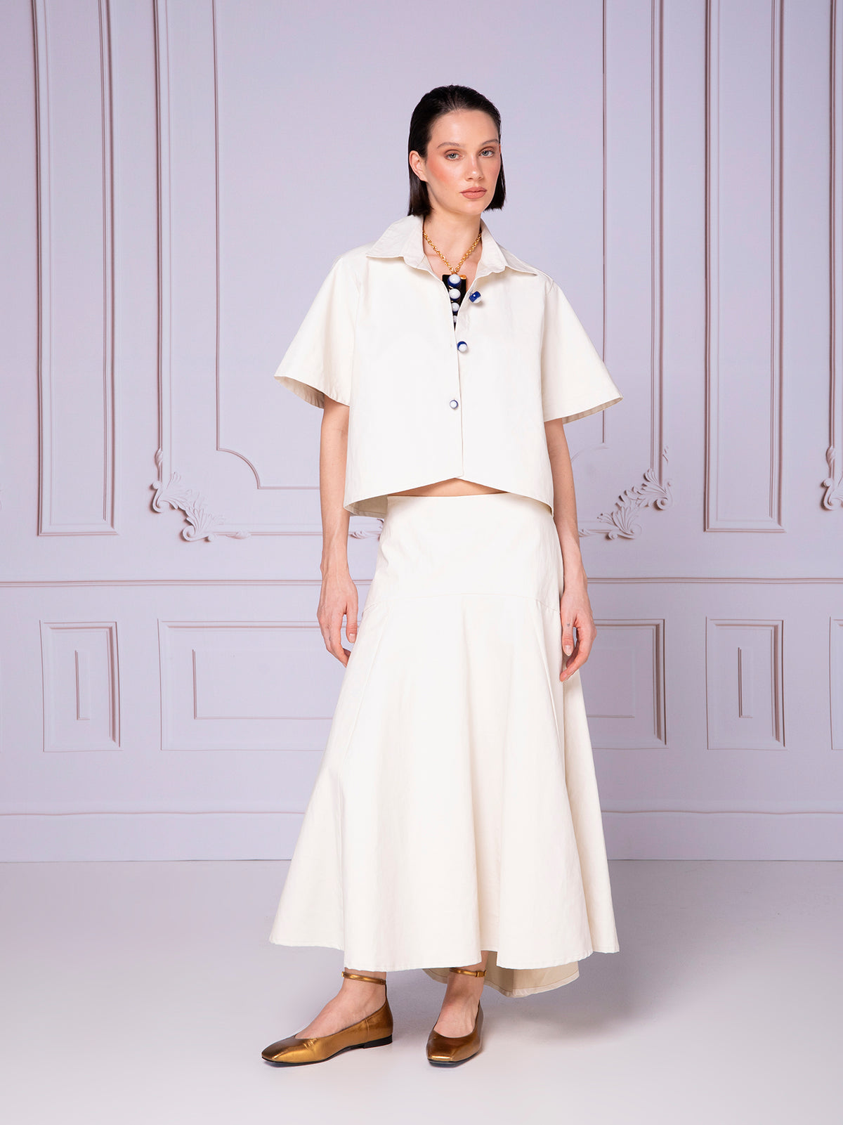 Blusa camisera asimétrica en lino